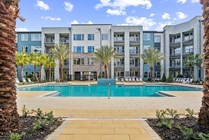 Experience resort-style living with our pristine pool and modern design.