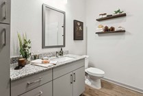 Experience modern elegance in this perfectly curated bathroom space.