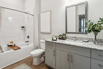 Indulge in this elegant bathroom oasis, designed for relaxation and style.