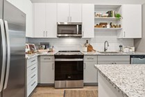 Experience this contemporary kitchen, equipped with modern amenities for the perfect culinary adventure.