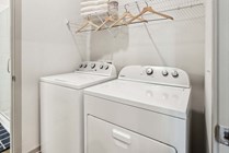 Experience the convenience of this stylish laundry room, designed for efficiency.
